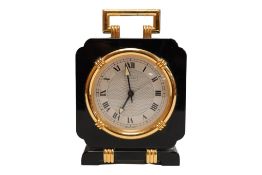 A boxed Must de Cartier black onyx clock, 90170034, with case, 11cm high