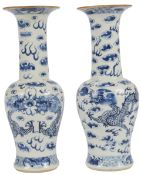 A pair of Chinese blue and white ‘dragon’ vases, late 19th century, each painted with confronting