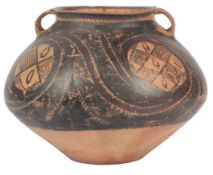 A Chinese Neolithic pottery jar, Majiayao Culture, 3300-2200 BC, painted in black pigment with