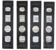 A set of four Chinese dreamstone inset ebonised wood panels, 19th century, the dreamstones with