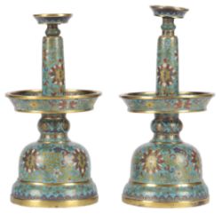 A rare pair of Chinese gilded cloisonné enamel ‘lotus’ candlesticks which convert to altar sets,