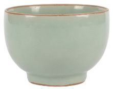 A Chinese celadon bowl, Song dynasty or later, burnt orange glazed rim and foot, diameter 12cm