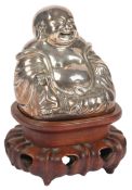 A Chinese silver model of a seated Budai, early 20th century, engraved details, two character