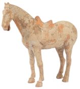 A large Chinese terracotta model of a horse, probably Tang dynasty (618-907 AD), height 40.5cm,
