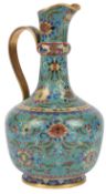 A Chinese cloisonné enamel ewer, 18th century, finely decorated in red, blue, white, lavender, green
