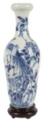 A tall Chinese blue and white 'phoenix and peony' vase, 19th century, the slight ogee-shaped body