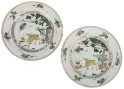 A pair of Chinese famille verte ‘longevity’ chargers, Kangxi period, each painted with a crane and