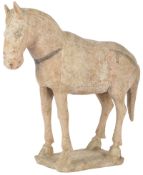 A Chinese pottery model of a horse, probably Northern Wei dynasty, 6th/7th century AD, with