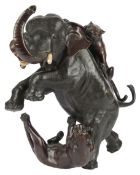 A large Japanese bronze okimono of tigers attacking an elephant, Meiji period, signed Tsunemitsu,