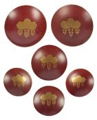 A group of six Japanese Imperial red lacquer sakazuki (sake cups), late Meiji period, each gilt