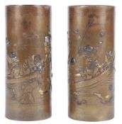 A pair of Japanese mixed metal brushpots, Meiji period, each relief decorated with figures in a boat