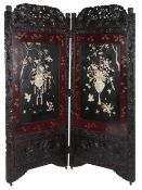 A Japanese twofold hardwood, shibayama and lacquer, Meiji period, carved and inlaid with ivory, bone