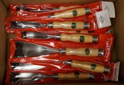 A set of eleven individually packeted Henry Taylor Tools large wood working gouges, the largest appr