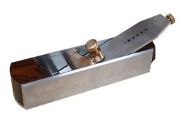 A Karl Holtey dovetailed steel adjustable mitre plane, with brass lever cap and figured rosewood inf