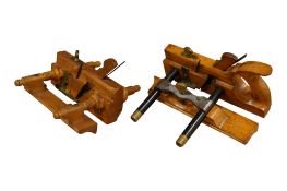 Two woodworking sash fillisters; a Matheison & Son with ebony arms and a dovetailed box sole, togeth
