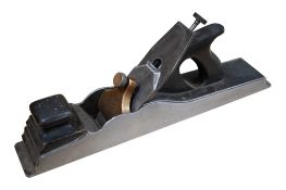A Norris A1 jointer plane, with Rosewood infill, and fitted with a later iron by Ray Iles, the sole