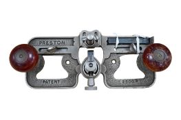 A scarce Preston No.2500P router fitted with a fence either side of the cutter, and with two cutters
