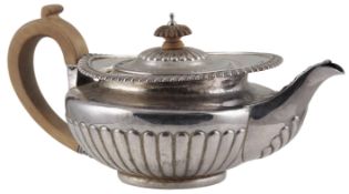 A George IV demi-fluted silver teapot, by Eames & Barnard