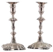 A pair of late George II cast silver candlesticks, by John Quantock
