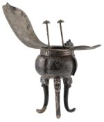 An early 20th century Chinese white metal tripod vessel (Jue), by Luenwo
