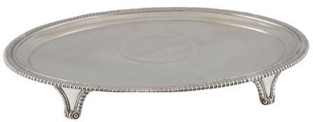 A Gorge III silver oval teapot stand, by Thomas Hannam & John Crouch II