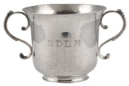 An 18th century Channel Islands silver two handled christening cup, maker's mark JH