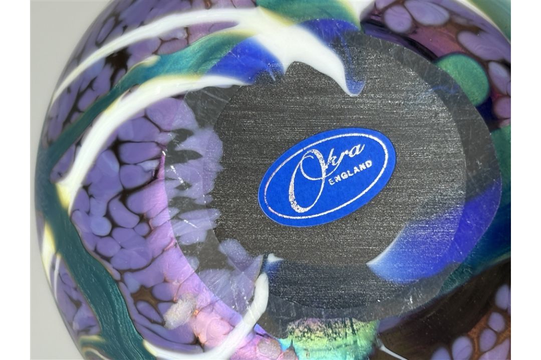 OKRA- AN IRIDESCENT ART GLASS APPLE PAPERWEIGHT decorated in purple and ...
