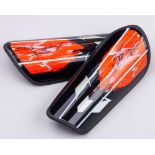 A pair of Lionel Messi autographed black and orange Adidas Messi Club shin pads