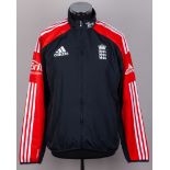 James Anderson blue and red England cricket tracksuit jacket