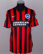 Aaron Hughes red and black No.4 Brighton & Hove Albion v. Norwich match worn shirt, 2014