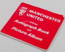 A Manchester United autographed book and picture album