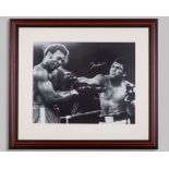 Muhammad Ali and George Foreman - an autographed black and white photograph