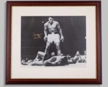 Muhammad Ali - an autographed black and white photograph