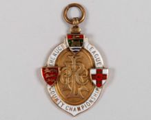 Martin Hodgson 14ct gold and enamel rugby league championship winners medal, 1932-33
