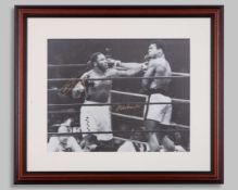 Muhammad Ali and Joe Frazier - an autographed black and white photograph