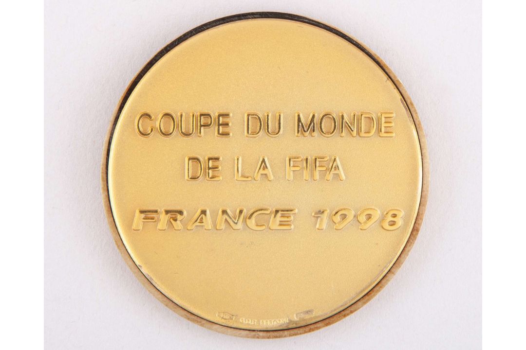 David Will: yellow-metal FIFA 1998 World Cup medal, designed by Bertoni - Image 1 of 4