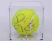 Roger Federer an autographed Wimbledon tennis ball, 2006