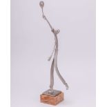 A rare 1930s Hagenauer style figurine mounted onto a square onyx base