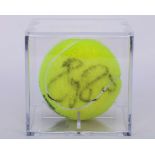 Roger Federer an autographed Wimbledon tennis ball, 2004