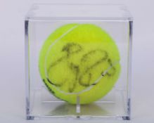 Roger Federer an autographed Wimbledon tennis ball, 2004