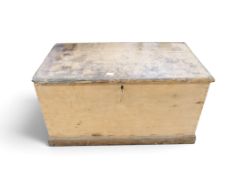 A Victorian pine blanket chest with internal candle storage of plinth base, 56cm high x 106cm wide x