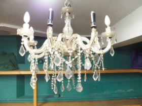 A lot comprising an early 20th century eight branch chandelier with cut glass droplets and two