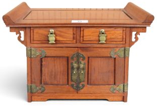 A 20th century Chinese elm jewellery chest in the form of a altar cabinet with two short drawers