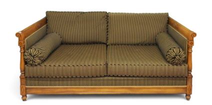 A contemporary Balzarotti of Paris walnut framed French Empire style three seater settee with