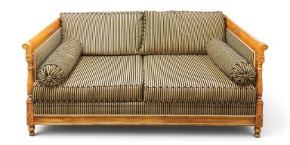A contemporary Balzarotti of Paris walnut framed French Empire style three seater settee with