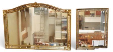 A lot comprising a contemporary arched gilt framed overmantle mirror, 89cm high x 129cm wide and