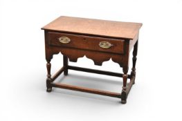 An 18th century oak lowboy side table