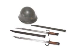 Two Imperial Japanese Type-30 Bayonets and a WW2 Japanese helmet shell