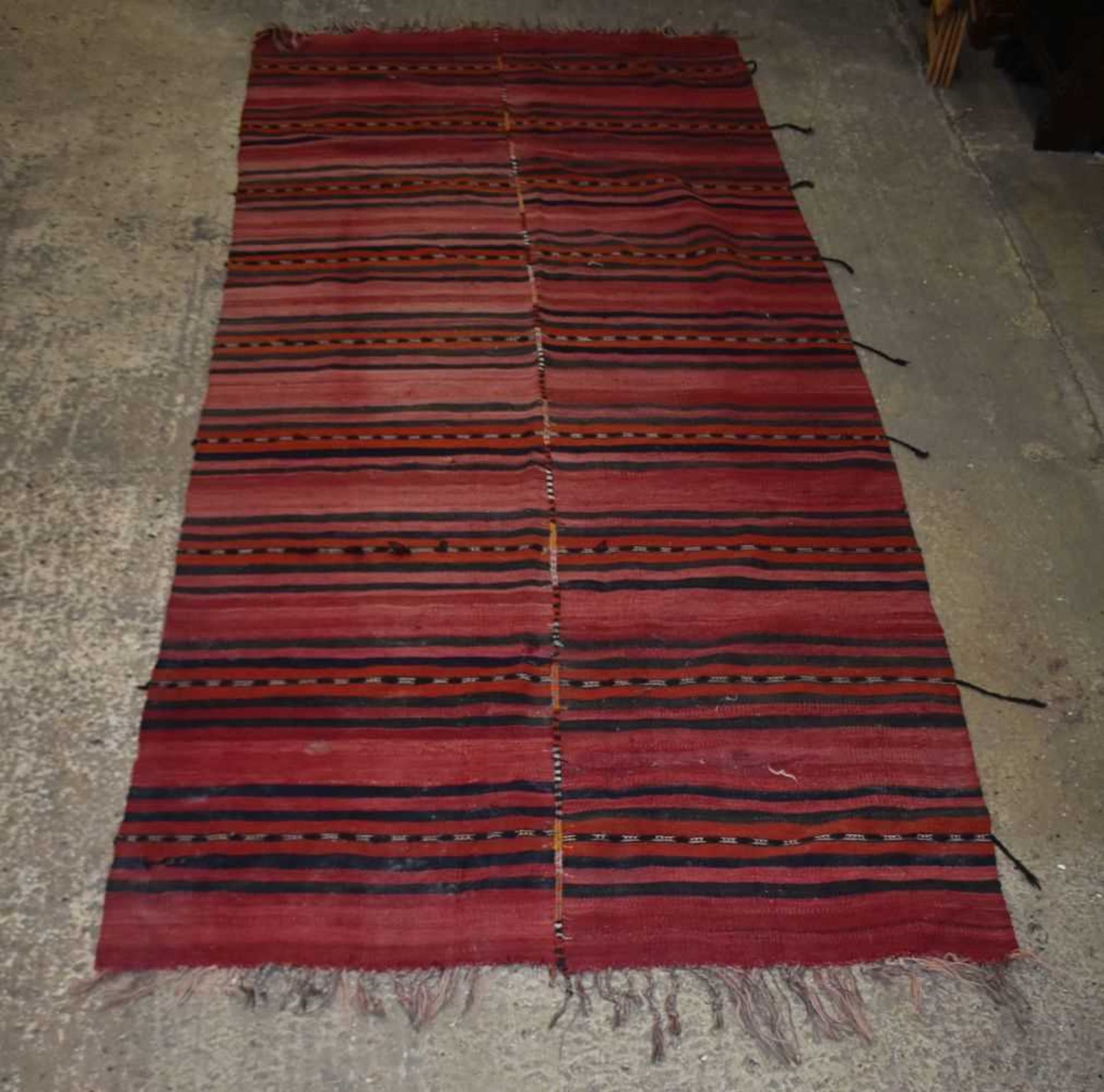 An Anatolian Kilim runner 300 x 142cm