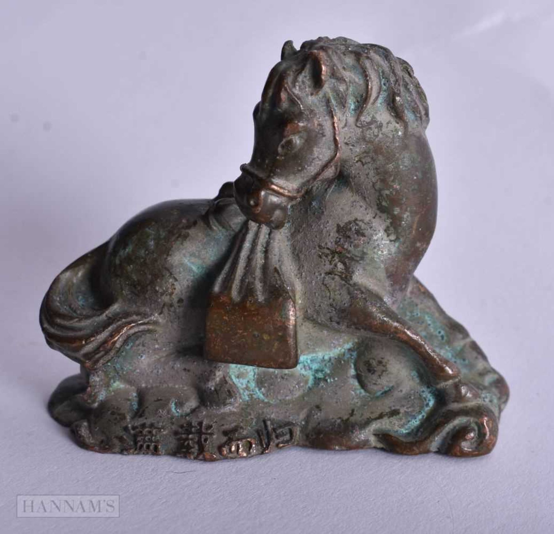 A Bronze Horse. 5.4cm x 6.3cm x 3.3cm, weight 228.6g